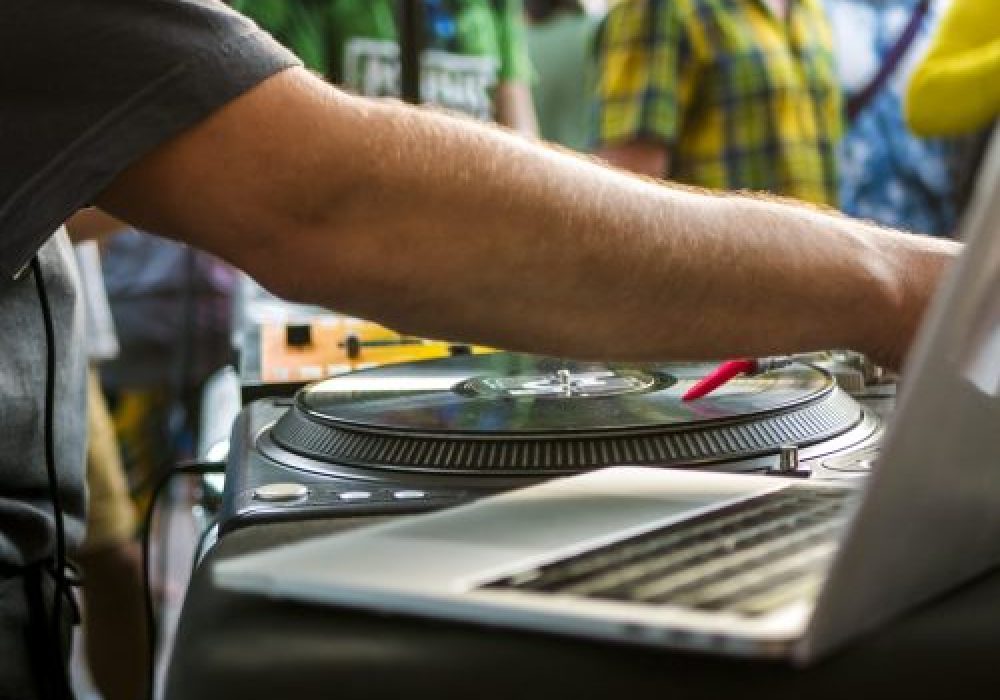 close-up-hand-adjusting-music-settings-on-the-lapt-2025-01-27-01-05-30-utc-scaled-r445trbtzb6nvo34fawt0m5av7xdkp4o4u56hkbrm0